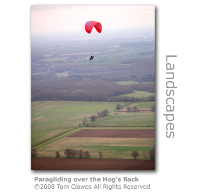 Paragliding over the Hog's Back by Tom Clowes